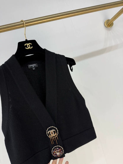 Chanel 22A black knitted vest with charms