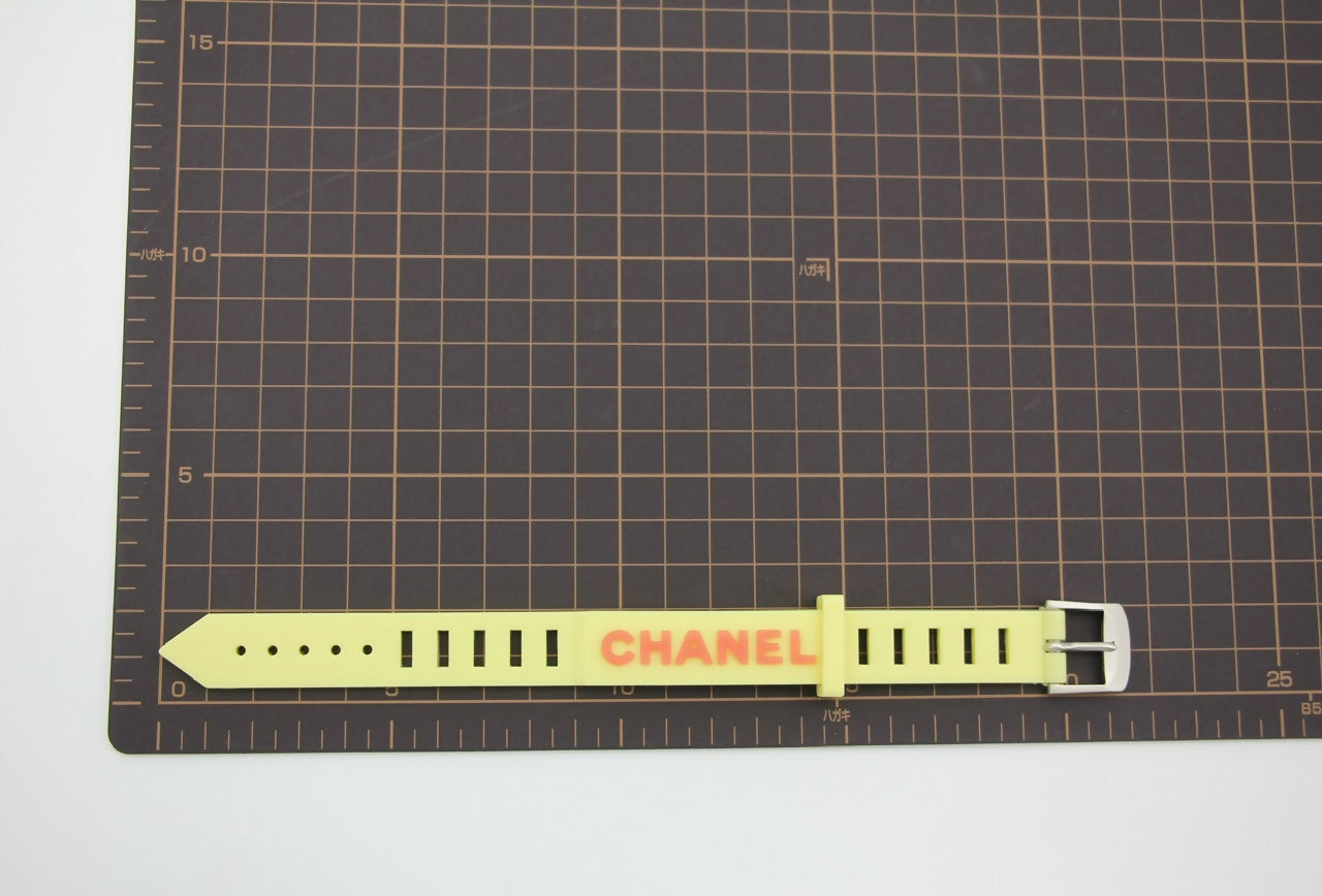 Chanel Vintage 99P Rubber Yellow with Orange Lettering Bracelet