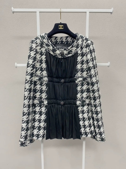 Chanel 2016 black tweed jacket with houndstooth pattern and pleated black textured silk panels