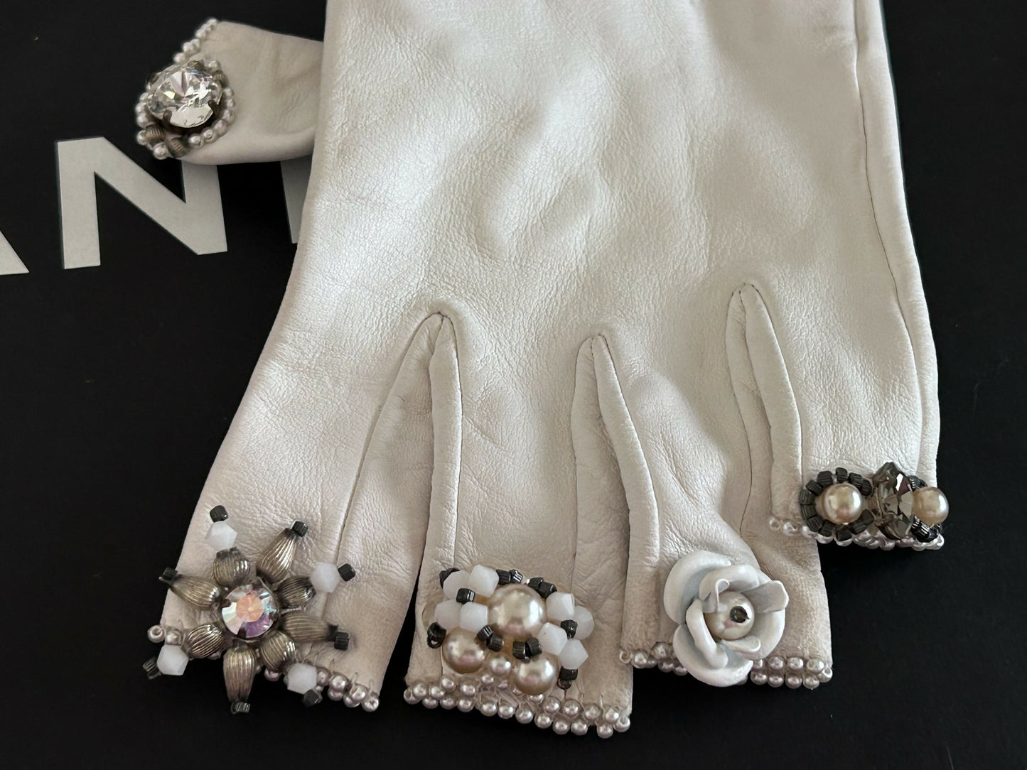 Chanel white fingerless gloves