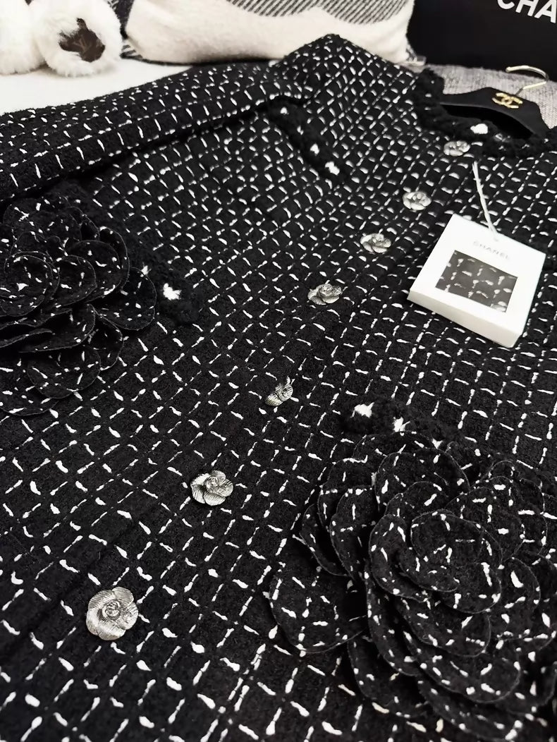 Chanel 23K black tweed jacket with white stitching