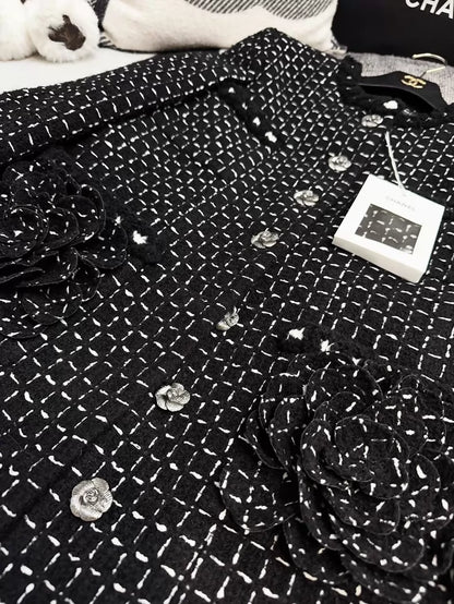 Chanel 23K black tweed jacket with white stitching