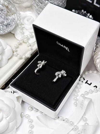 CHANEL earrings, white gold, full diamond bow, c