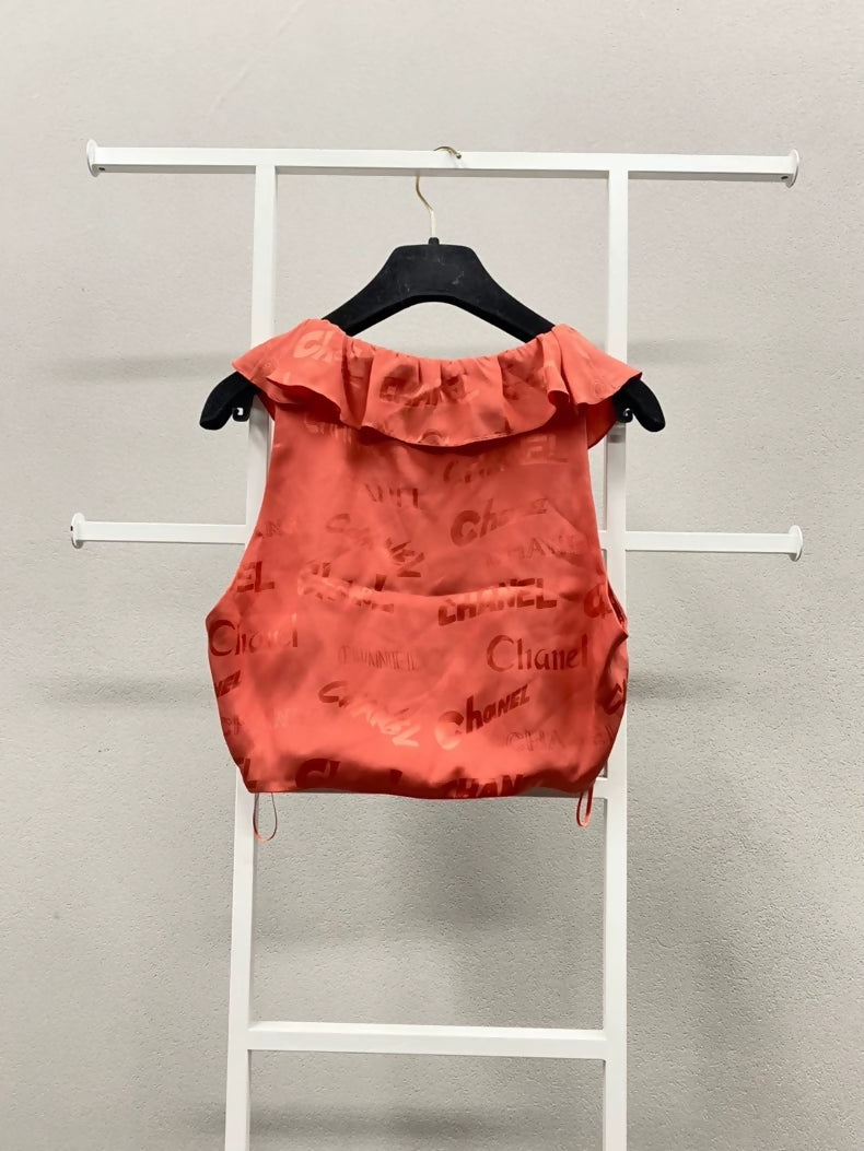 Chanel Red Lettering Ruffled Sleeveless Top