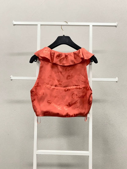 Chanel Red Lettering Ruffled Sleeveless Top