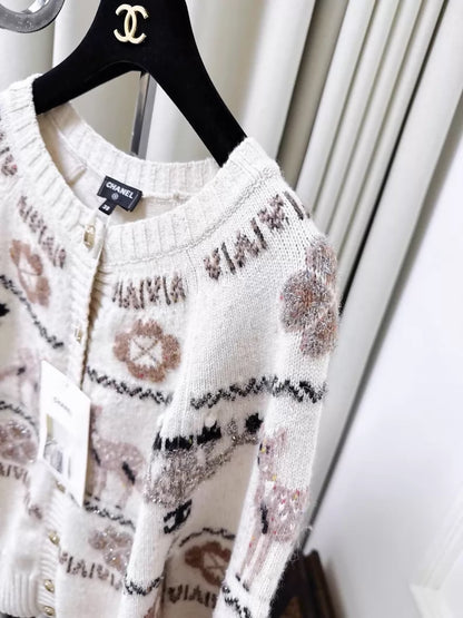 Chanel 25N beige cashmere cardigan with reindeer and four-leaf clover