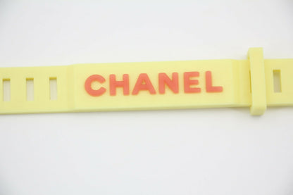 Chanel Vintage 99P Rubber Yellow with Orange Lettering Bracelet