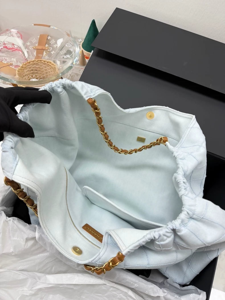 Chanel 26M Coco Beach light blue calfskin tote bag