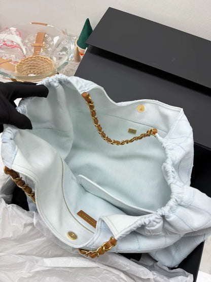 Chanel 26M Coco Beach light blue calfskin tote bag