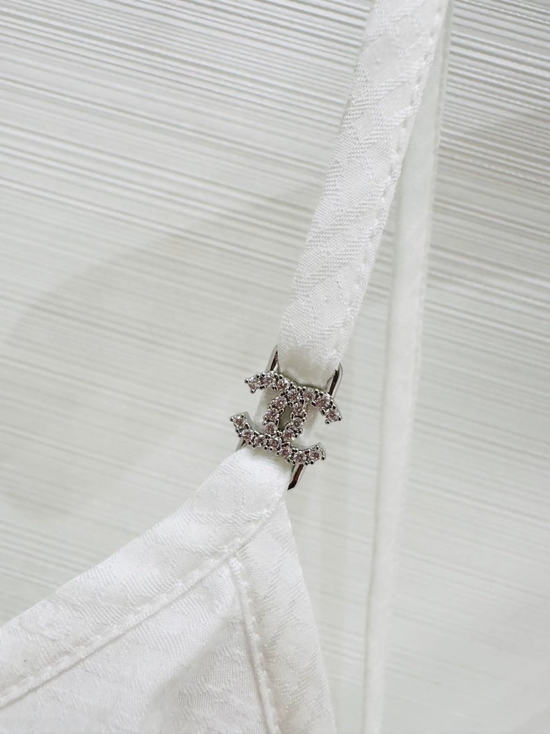 Chanel 25p white top with pearl laces