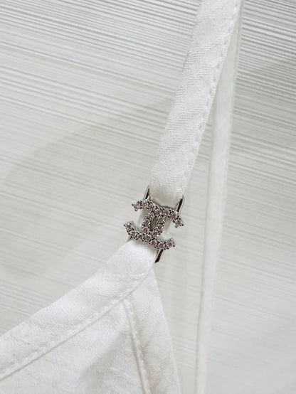 Chanel 25p white top with pearl laces