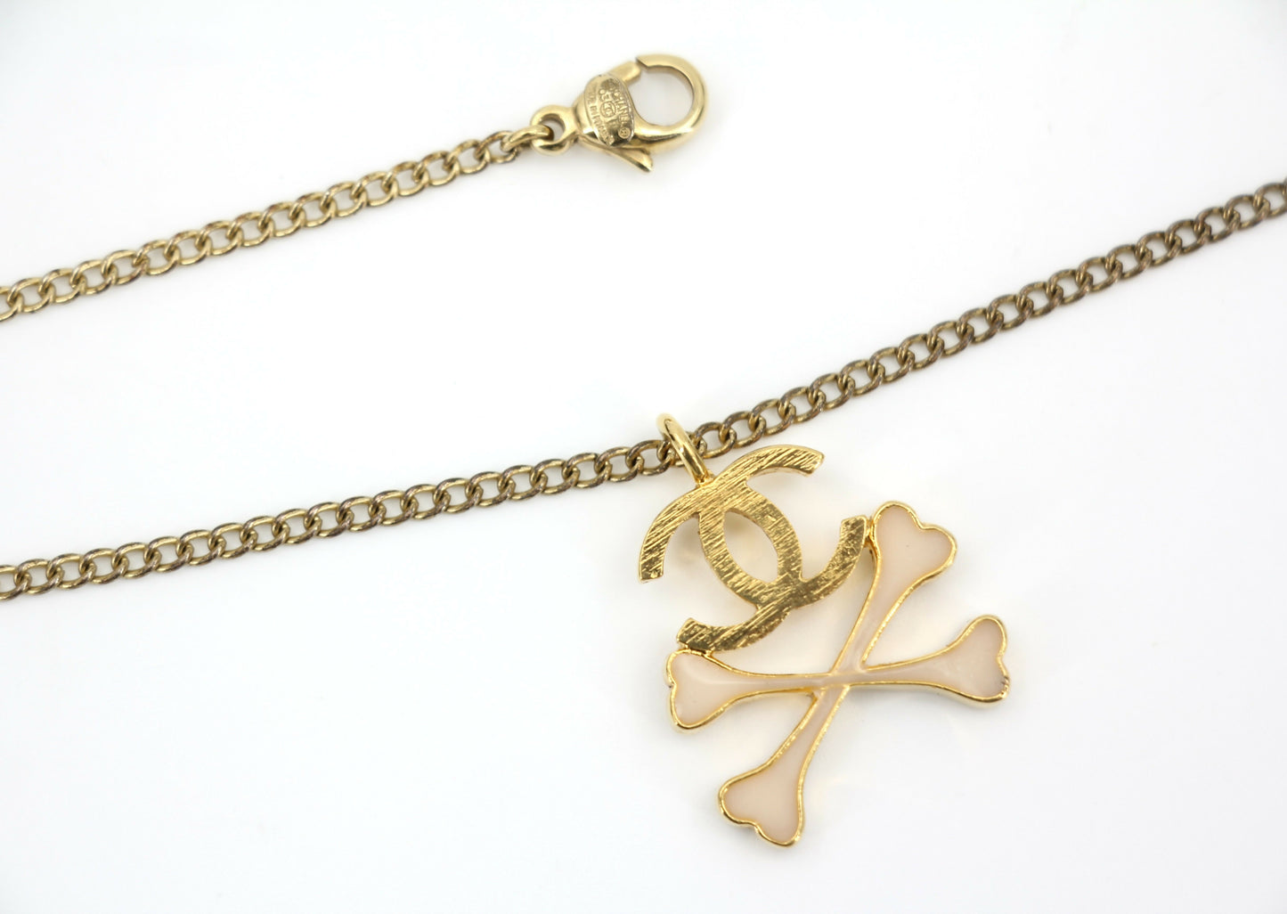 Chanel Vintage 03P Gold-plated CC Enamel White Skull Necklace