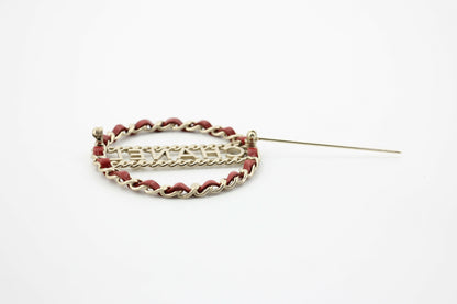 Chanel B18K Leather Red Metal Round Brooch