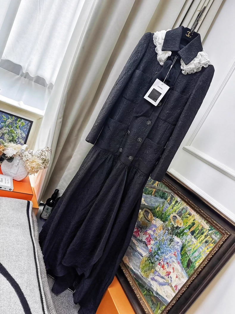 Chanel 21A Black Embossed Long Coat with Ruffled Collar