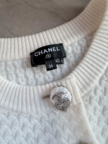 Chanel 24A white cashmere cardigan with charms buttons