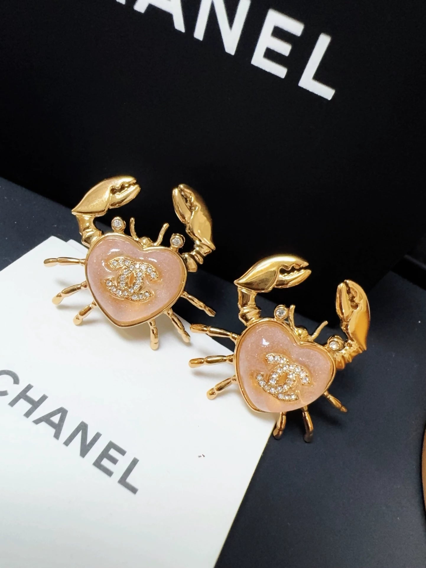 Chanel 25c ocean crab earrings
