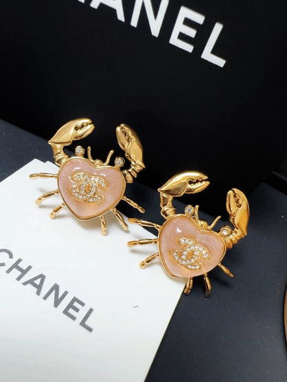 Chanel 25c ocean crab earrings