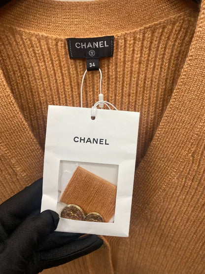 Chanel 21A Castle series orange printed knitted cardigan