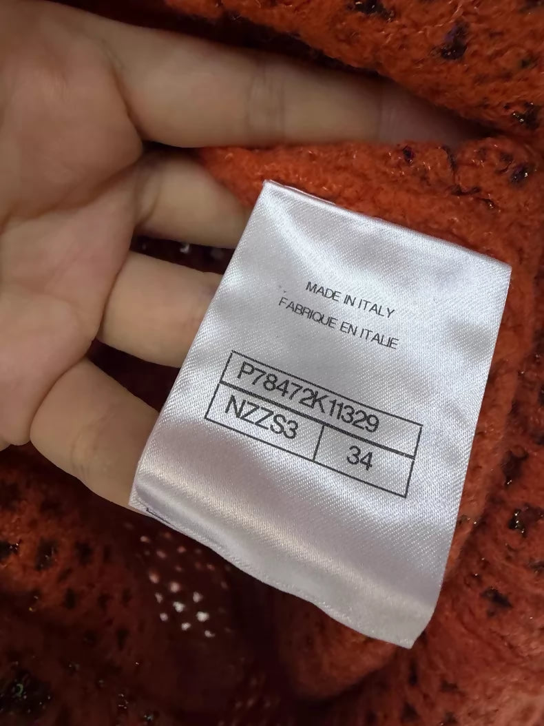 Chanel 24K black and orange shimmering knit dress with two pockets,