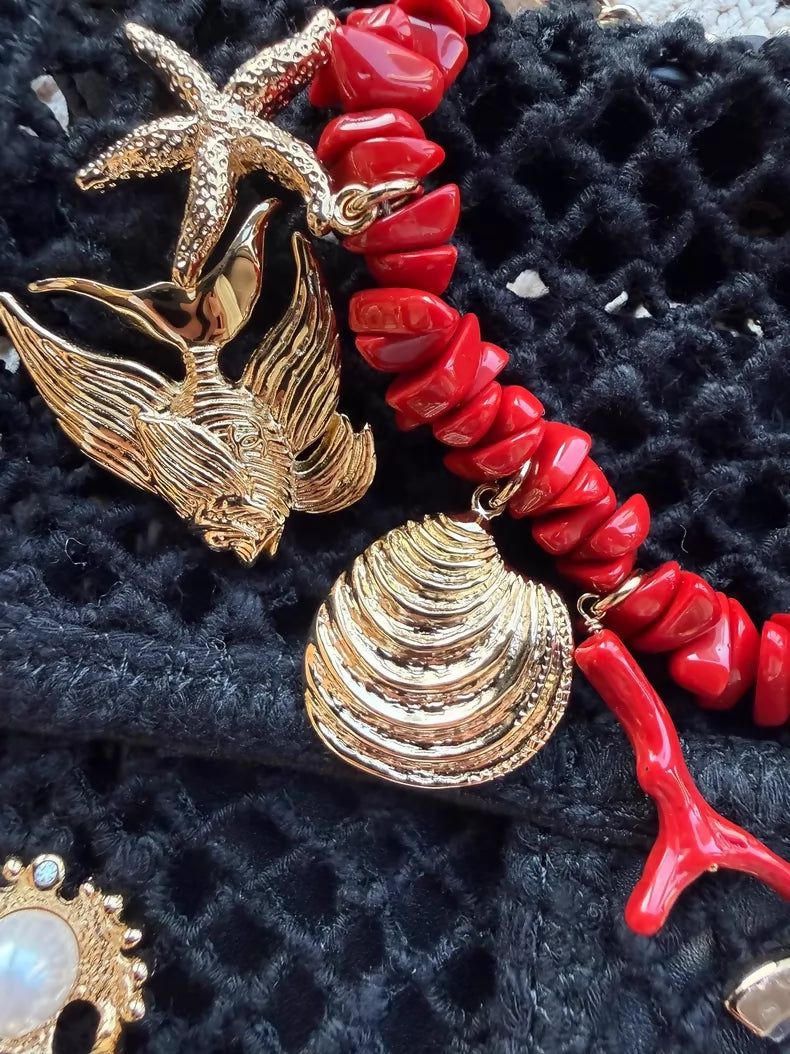 Chanel 26M black knit bag with gold ocean charms and red corals