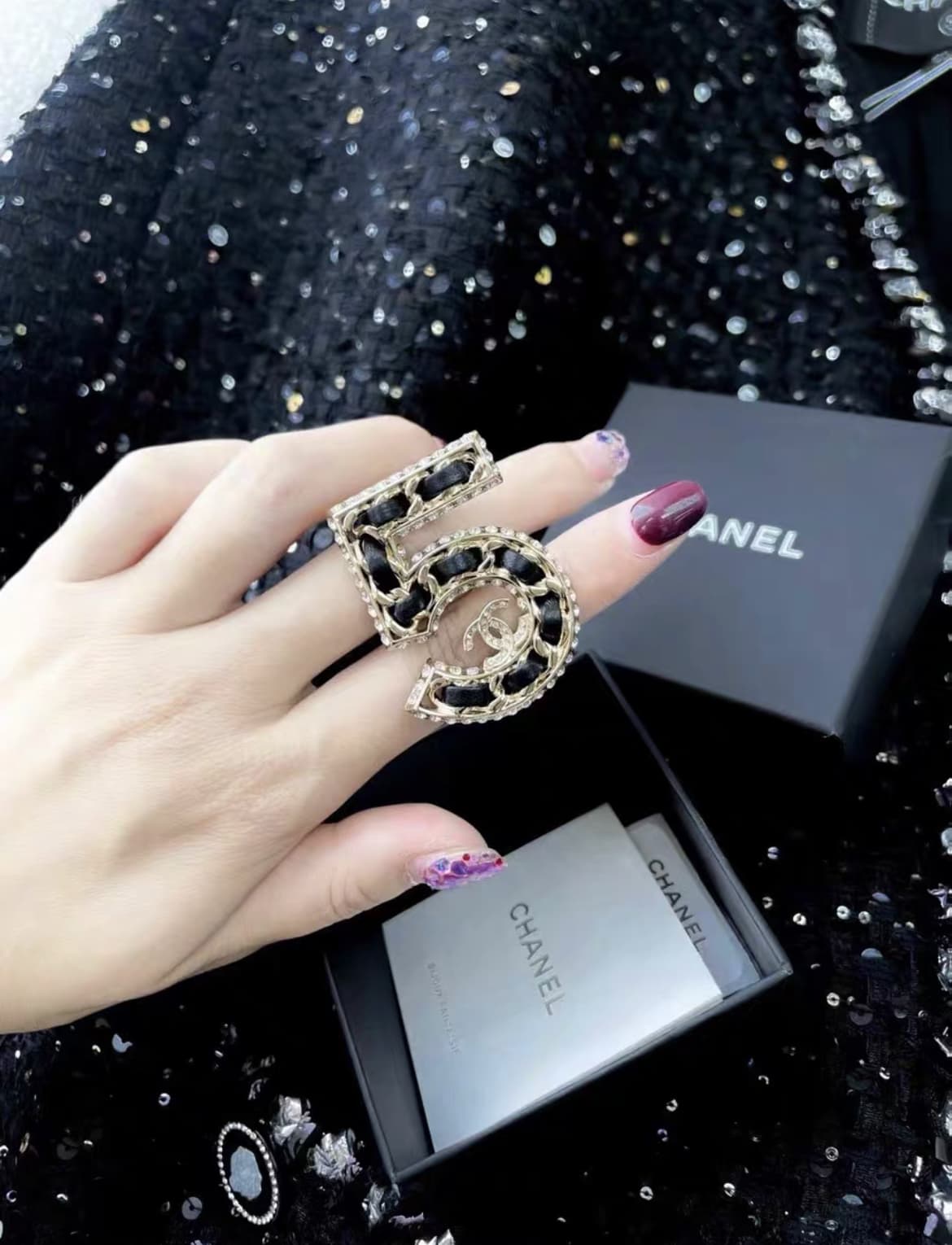 Chanel leather and metal number 5 ring