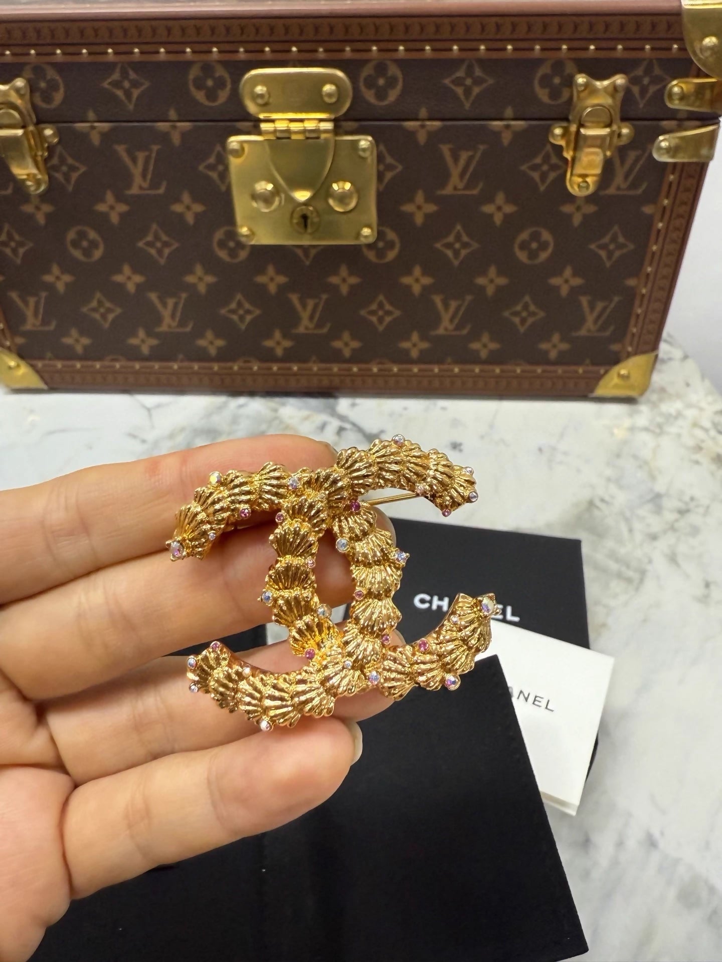 Chanel 23C double C gold shell rhinestone brooch