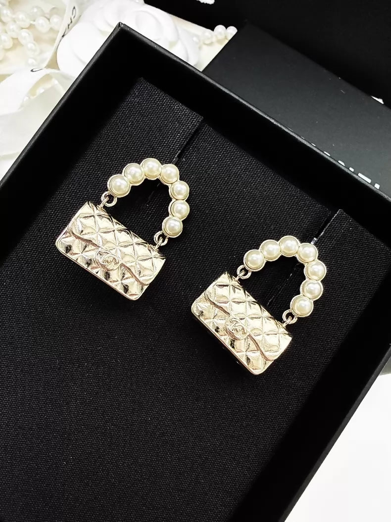 Chanel 21S light gold CF pearl quilted bag earrings