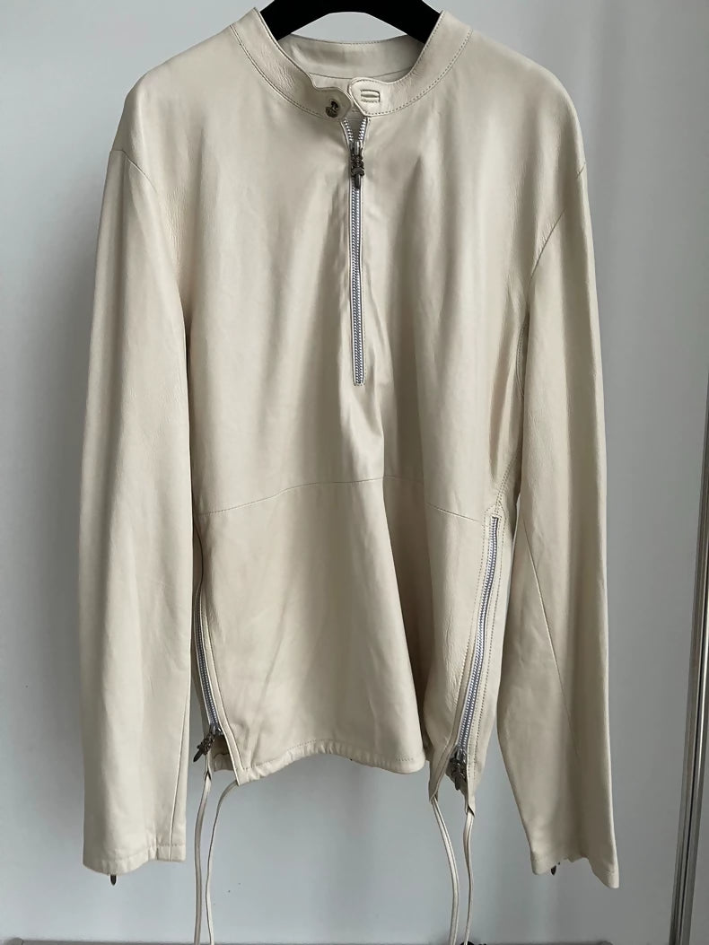 Chrome Hearts leather top with black crosses in the back