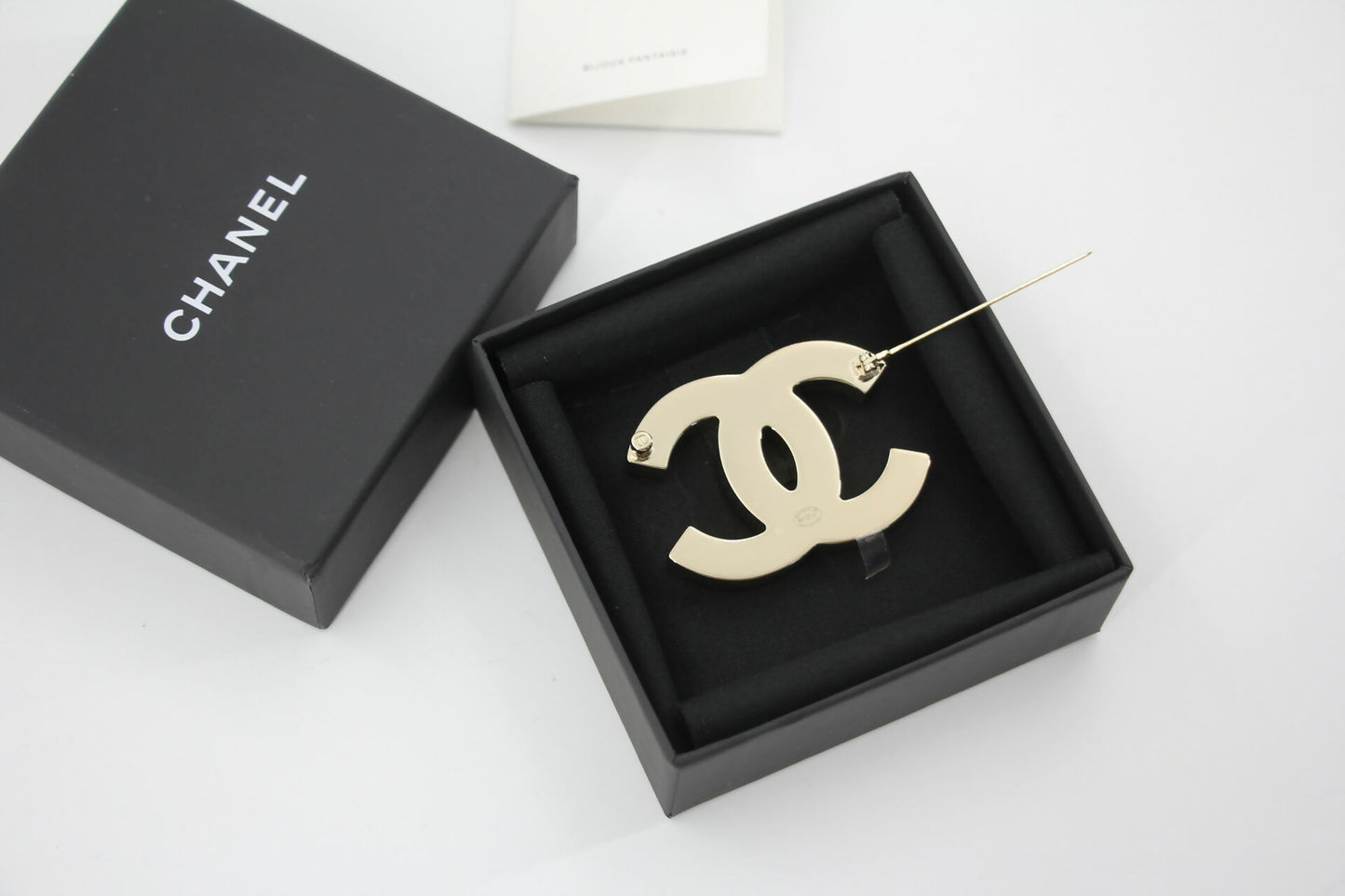 Chanel B23C Enamel Black and White Two-Tone CC Brooch