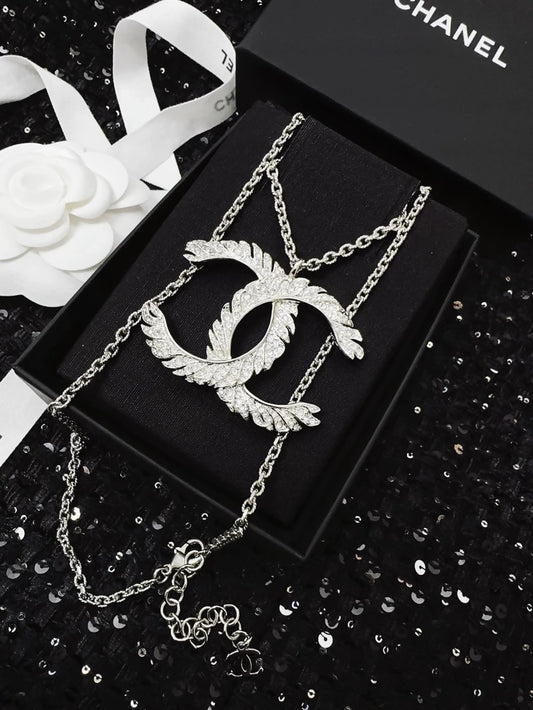 Chanel 25S double C logo feather