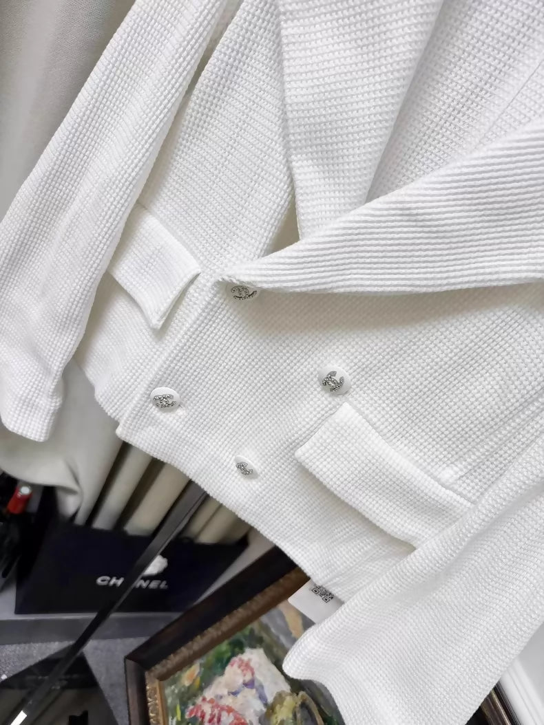 Chanel 21C white tweed jacket with rhinestone buttons