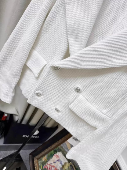 Chanel 21C white tweed jacket with rhinestone buttons