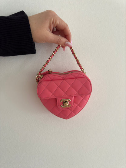 Rent the 22S CHANEL Pink Heart Bag CC in Love Mini Lambskin Crossbody Clutch bag