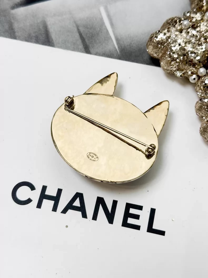 Chanel 19A black and gold double C logo cat brooch