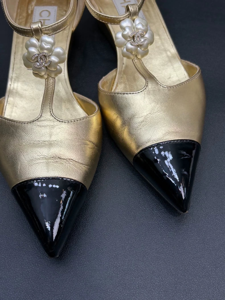 Chanel black and gold camellia shoes