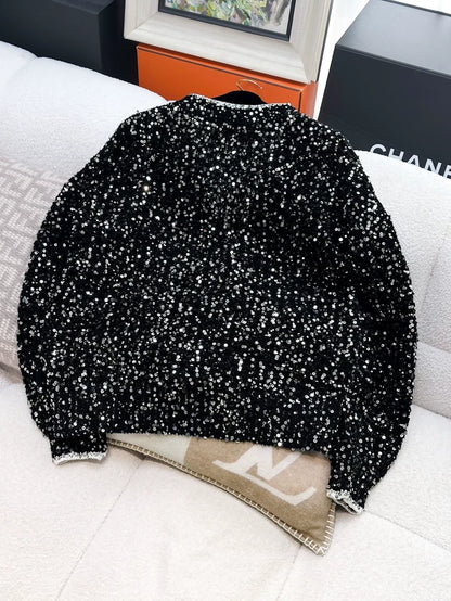Chanel 23SS black sequinned cardigan,
