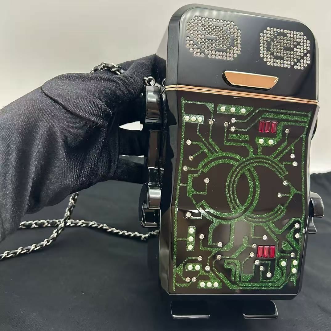 pre-owned chanel limited edition robot minaudière bag black plexiglass and crystals ruthenium hardware
