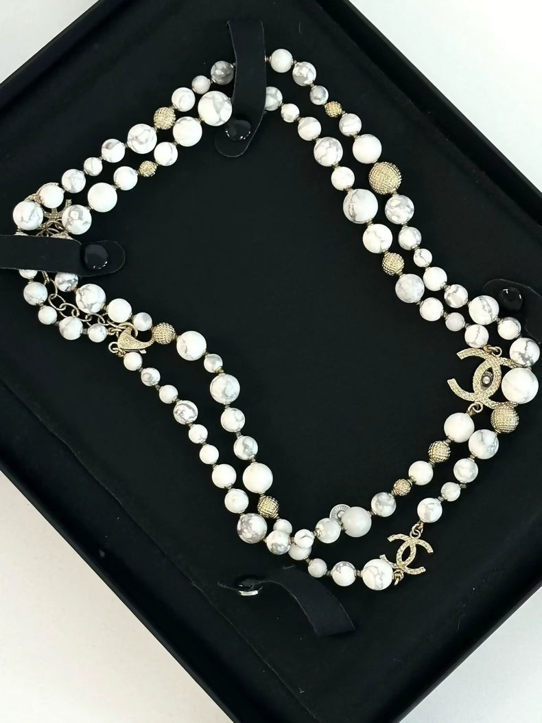 Chanel 16A necklace marble pearls