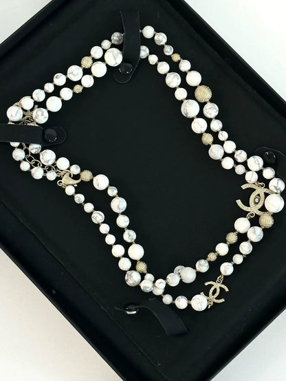 Chanel 16A necklace marble pearls