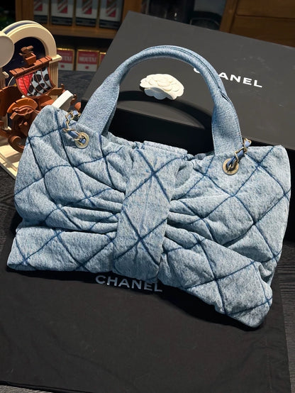 Chanel 25 light blue denim bow bag with gold hardware chain