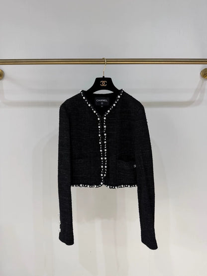 Chanel 25P pearl-trimmed black jacket