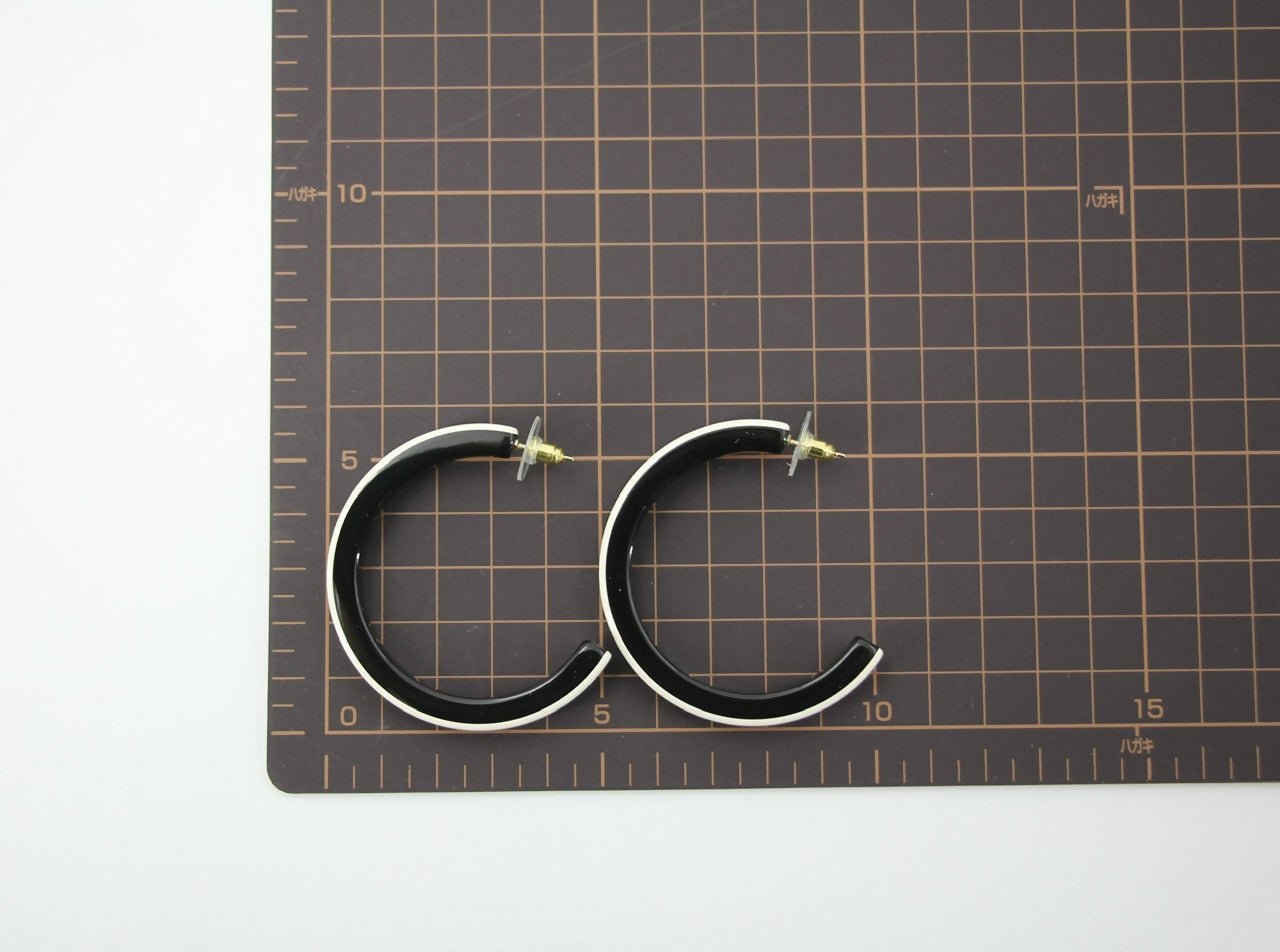 Chanel B22S Resin White Curved COCO Motif Hoop Stud Earrings