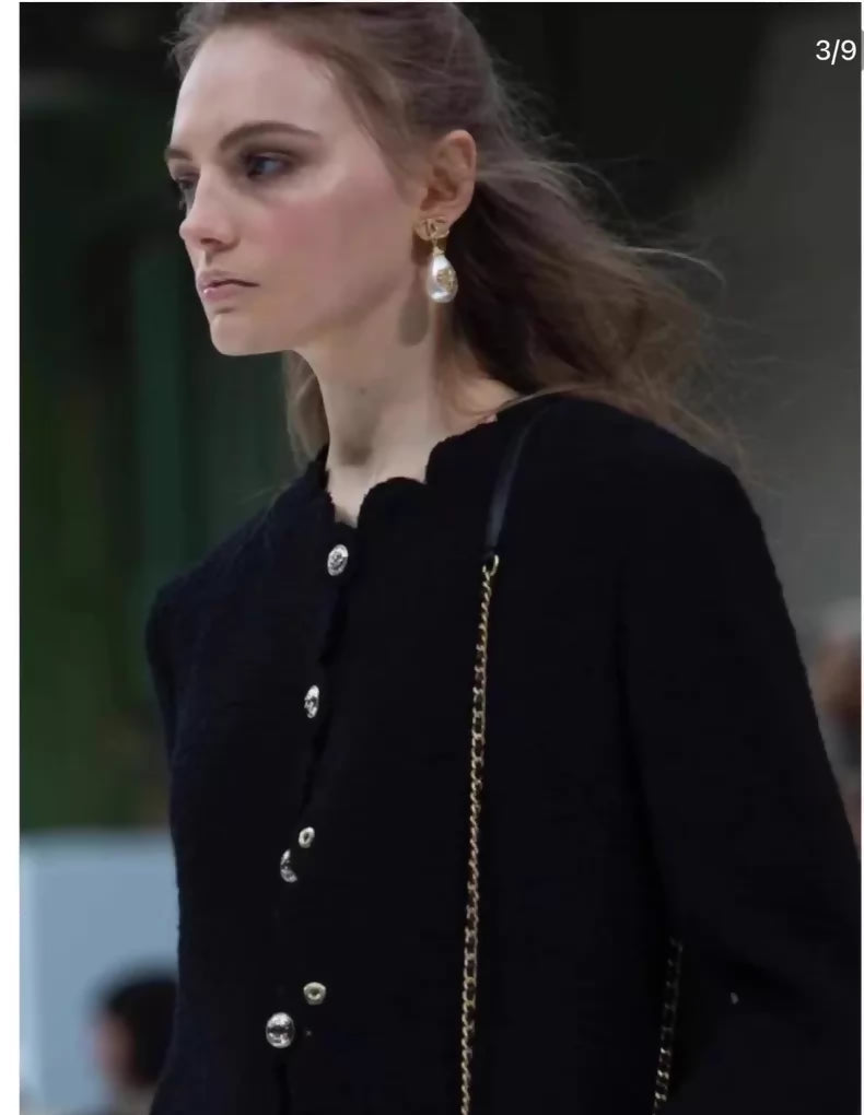 Chanel 20k black tweed jacket