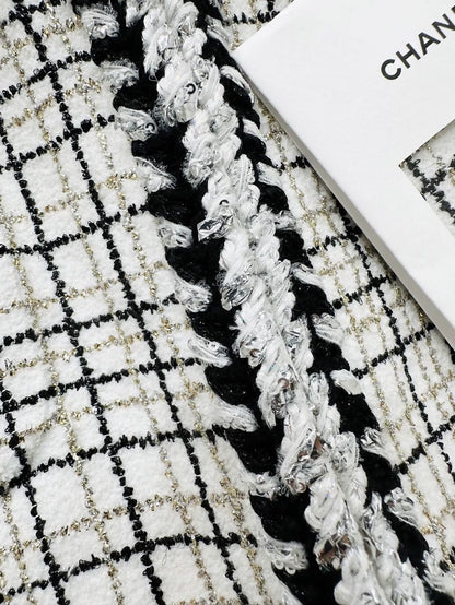 Chanel 24C jacket in black and white checkered tweed