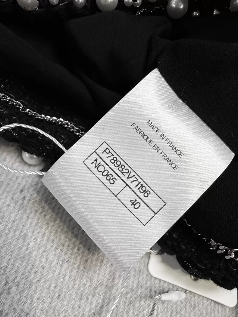 Chanel 25P black pearl-trimmed tweed jacket