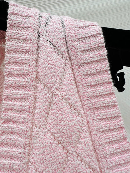 Chanel Spring/Summer 2023 pink knit vest,
