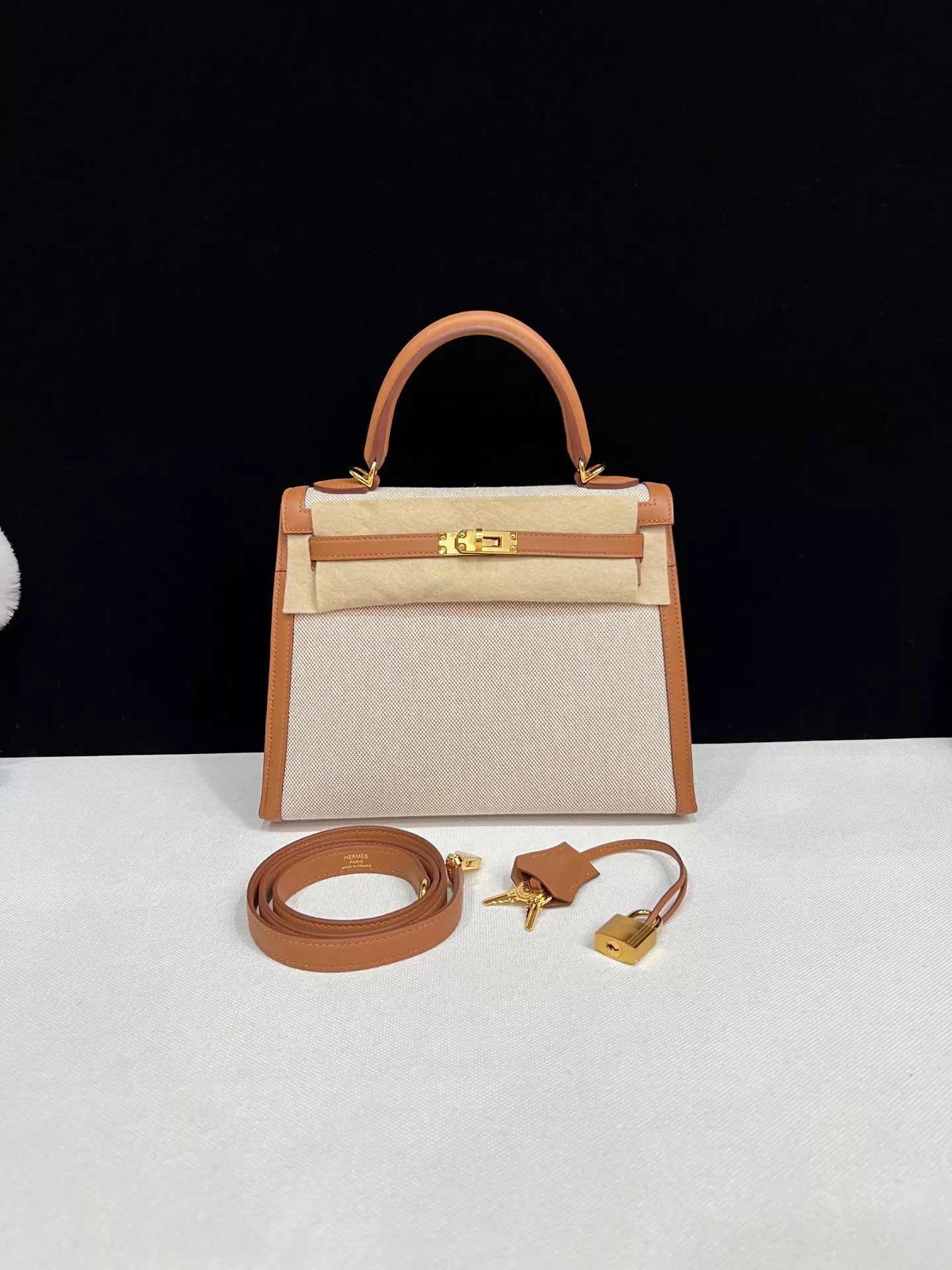 Hermes Kelly 25 Canvas with gold/brown swift leather and gold hardware