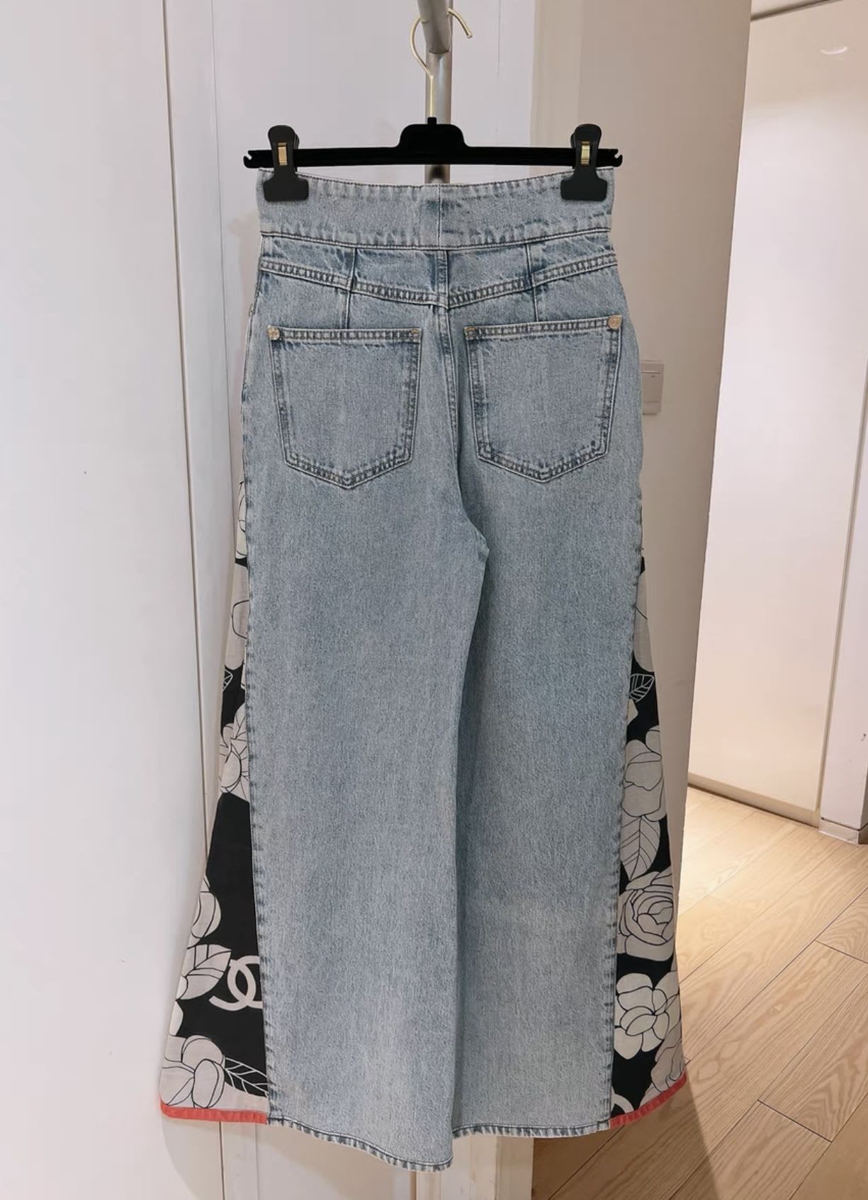 Chanel 21 catwalk camellia jeans