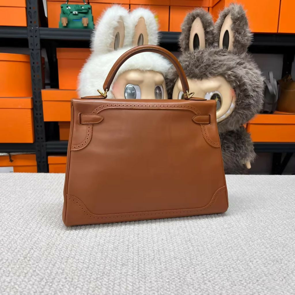 Hermes Kelly Ghillies bag 35 Retourne Fauve Tadelakt leather gold