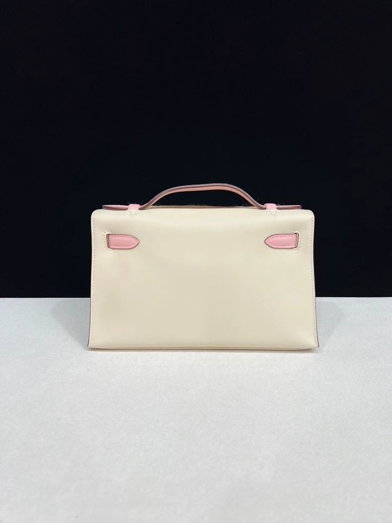 Hermes Kelly Pochette Craie & rose Sakura Pink Swift Leather with light gold hardware